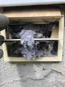 Clogged dryer vent with extreme lint build-up